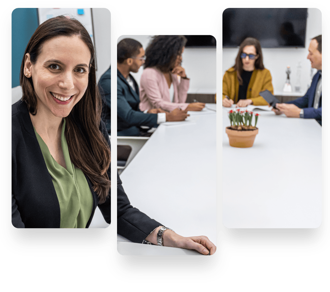 Diverse team in business meeting, woman smiling at camera.