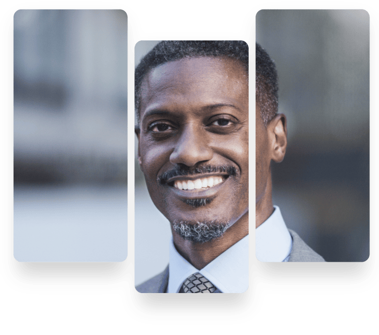 Confident Black businessman smiling in city setting