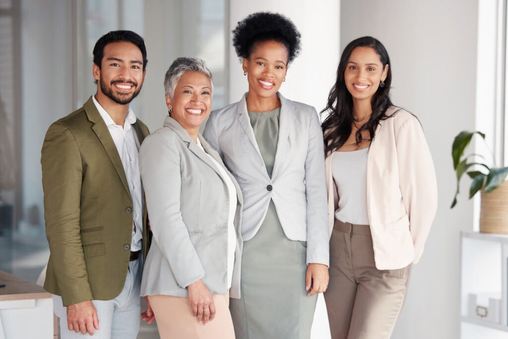 Diverse business team smiling in office