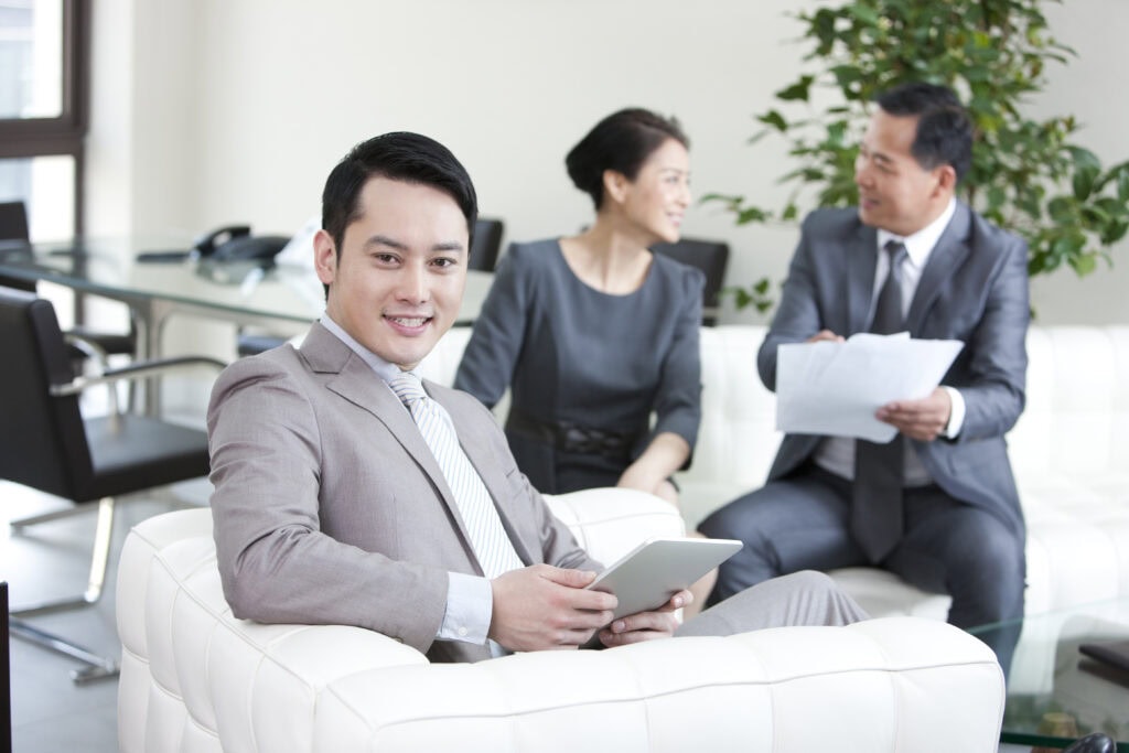 Business professionals discussing in modern office