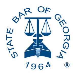 Logo of State Bar of Georgia, scales and 1964