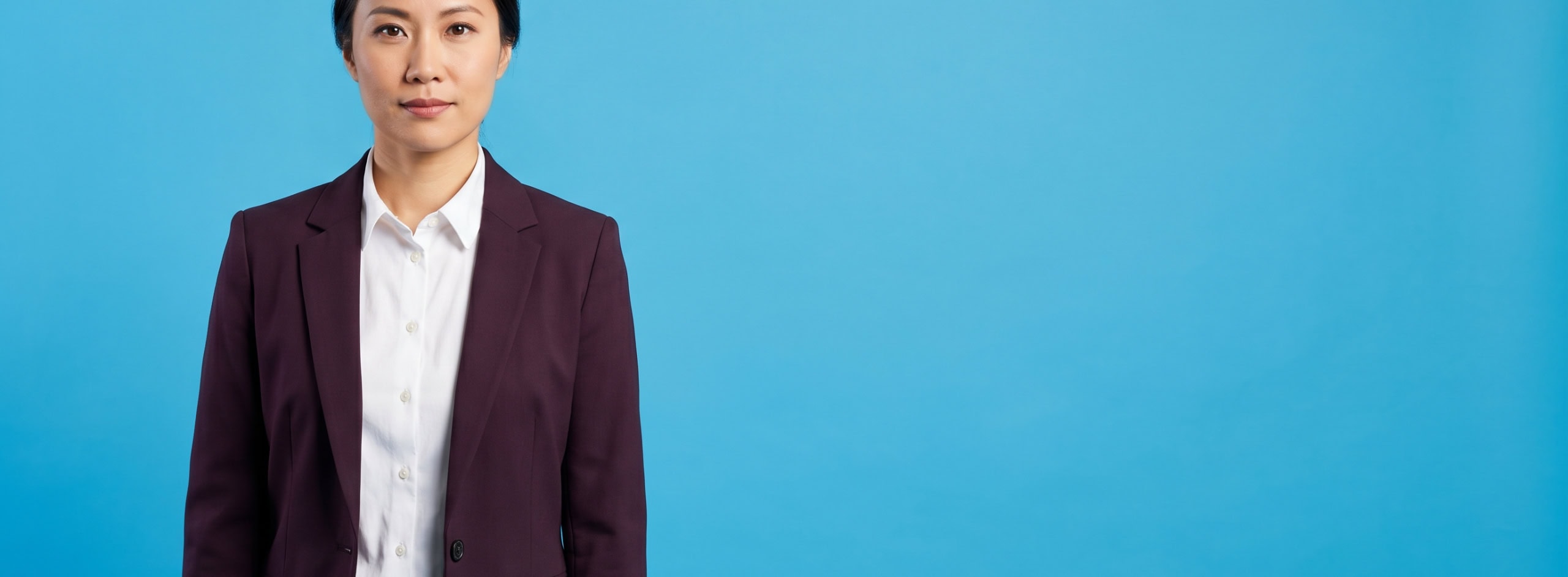 Professional portrait on blue studio background - The 63-Hour Window: Why Law Firms Lose Cases Between Friday and Monday