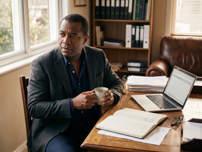 Black attorney in a client research scene, Forward Push vs. LawRank: Which Legal Marketing Agency Is Right for Your Law Firm?