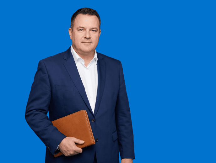 white male attorney, plus-size, late 40s in tailored navy suit with open-collar white shirt - The Referral Trap