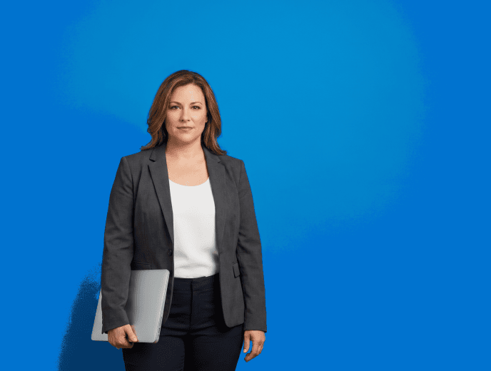 white female attorney, 40s, curvy build in charcoal blazer over white shell with tailored trousers - Omnipresence vs. Single-Channel