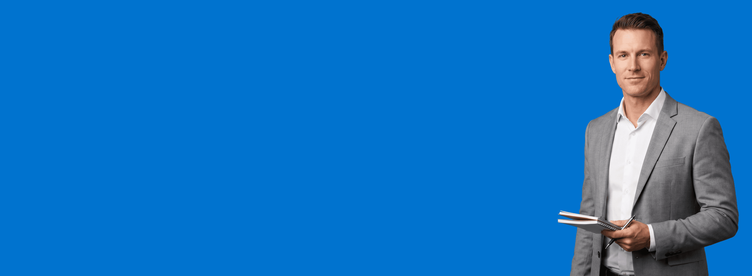 white male attorney, 30s, athletic build in light gray suit with white shirt, portrait against a saturated blue background - Answer Engine Optimization for Law Firms
