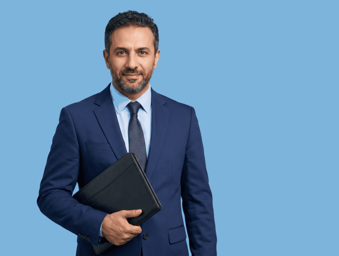 Middle Eastern male attorney, 40s, average build in navy suit with pale blue shirt - The Saturday Call
