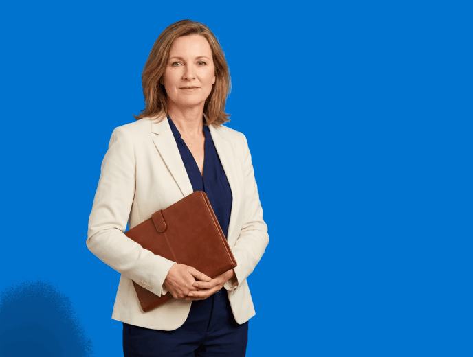 white female attorney, 50s, average build in cream blazer with navy trousers - AI-Generated Video for Attorneys