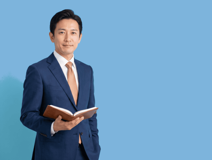 Asian male attorney, 30s to 40s, average build in navy suit and white shirt with subtle warm accent detail - Google Maps for Law Firms