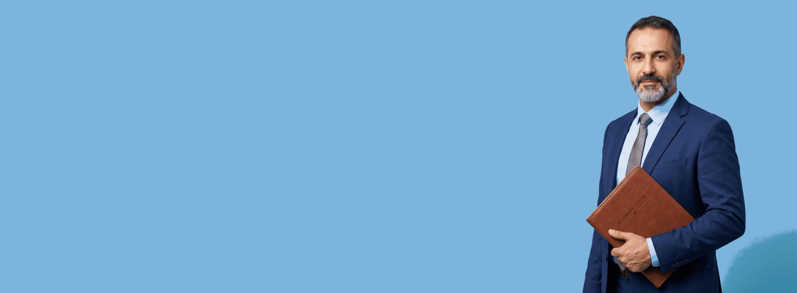 Middle Eastern male attorney, 40s, average build in navy suit with pale blue shirt, portrait against a light blue background - Forward Push vs. Hennessey Digital
