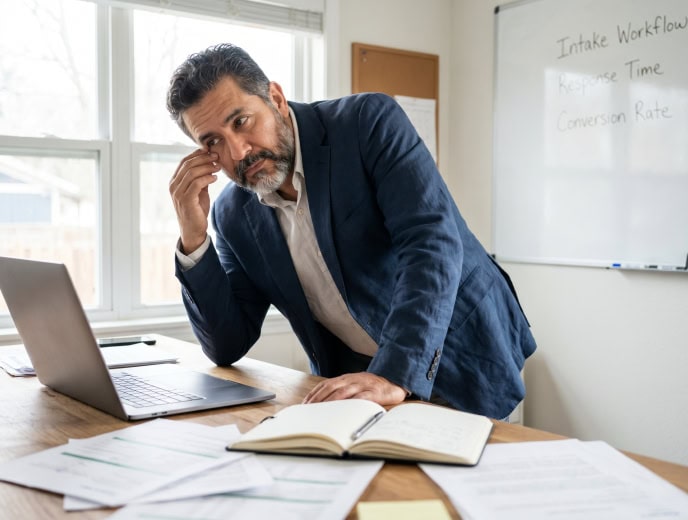Hispanic attorney in a professional marketing strategy scene, Law Firm Intake: The Hidden Revenue Leak Killing Growth